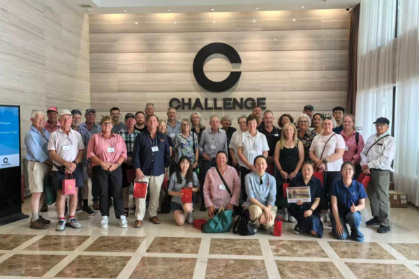 Large group of people gathered together to take a group photo on the Elders Wool tour of China