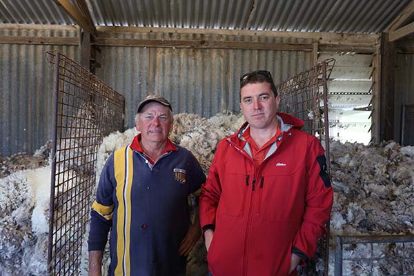 Classer and past Elders Branch Manager Daryl Johnson with Elders District Wool Manager Zach Wilson in Boulder Pastoral Company’s shearing shed. 