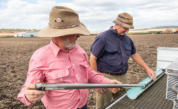 two_men_soil_testing